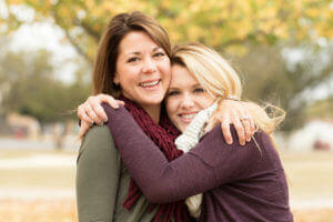 A Woman And Her Daughter Learning How To Help A Recovering Addict