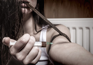 Heroin injection woman