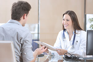 doctor talking with patient